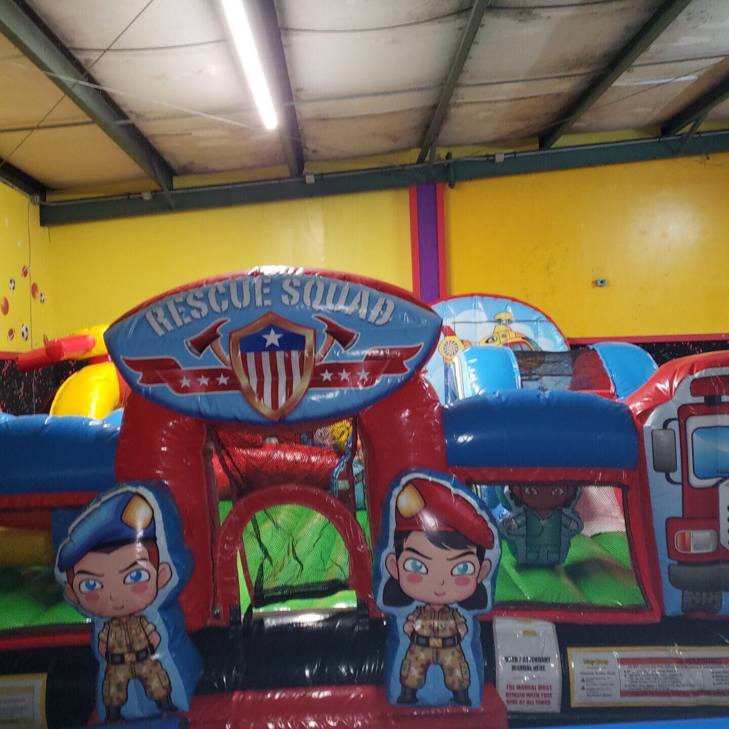 A bunch of inflatable toys in the shape of a rescue team.